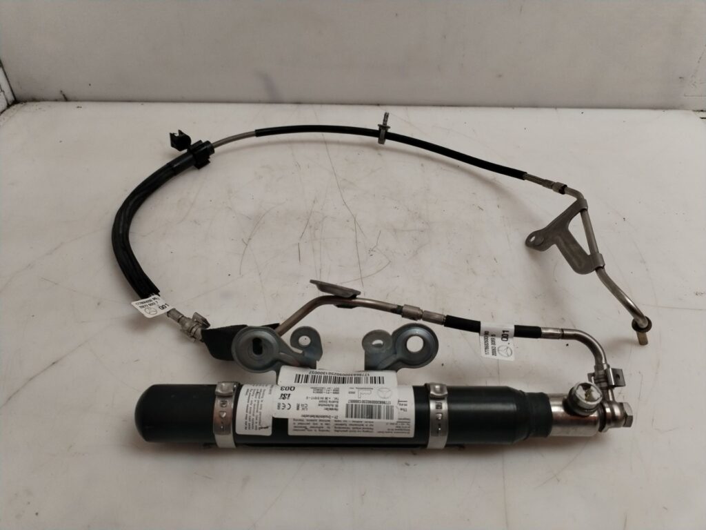 PRETENSOR AIRBAG DERECHO 125592