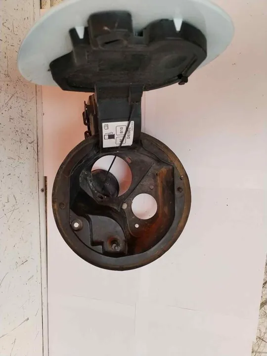 TAPA EXTERIOR COMBUSTIBLE 117470