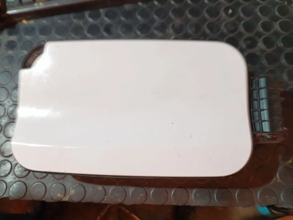 TAPA EXTERIOR COMBUSTIBLE 125901