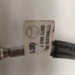PRETENSOR AIRBAG DERECHO 125592